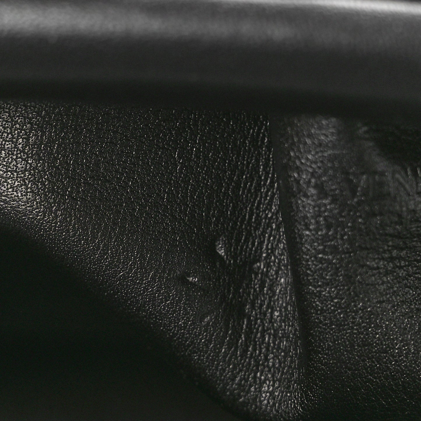Butter Calfskin The Mini Pouch Black