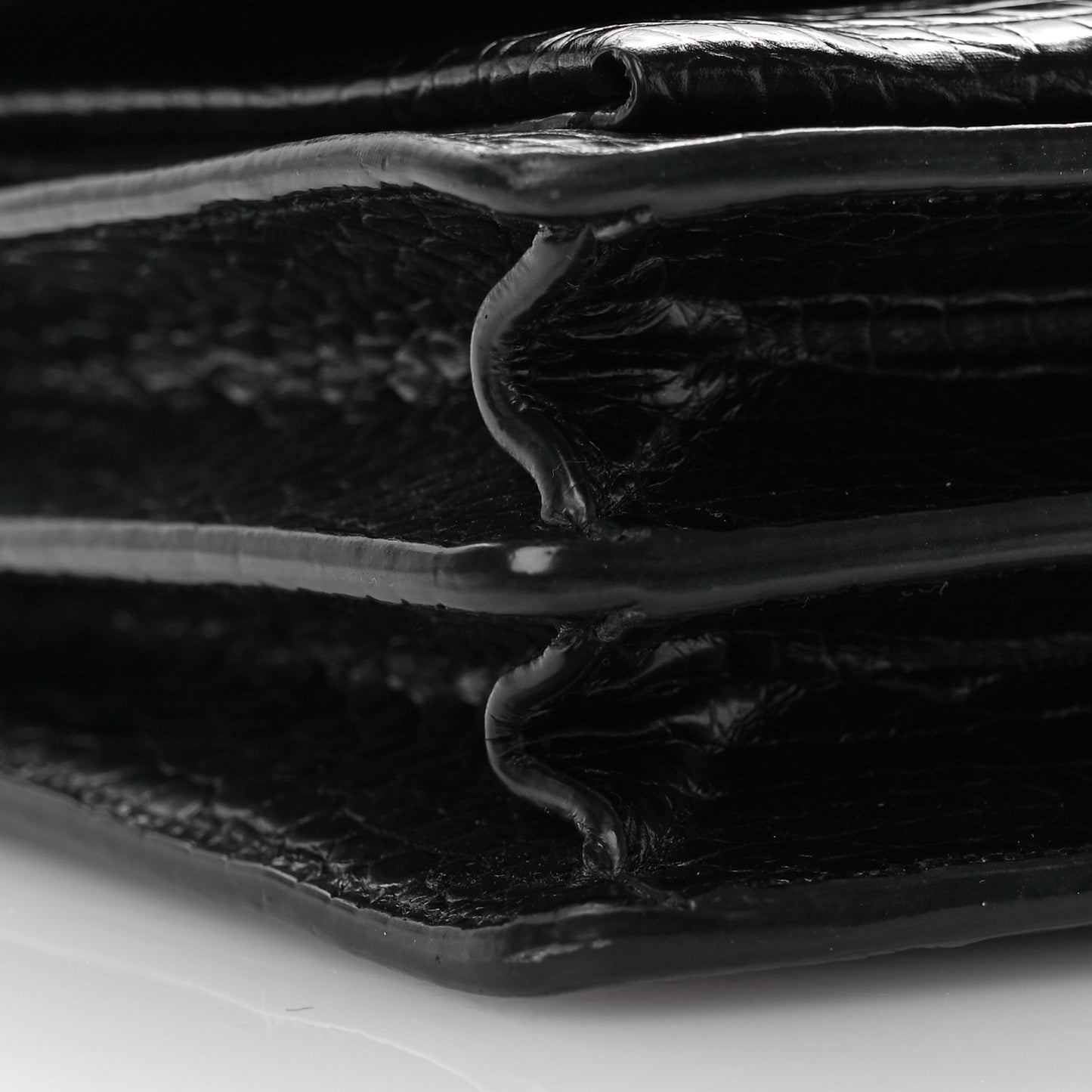 Calfskin Crocodile Embossed Medium Monogram Sunset Black