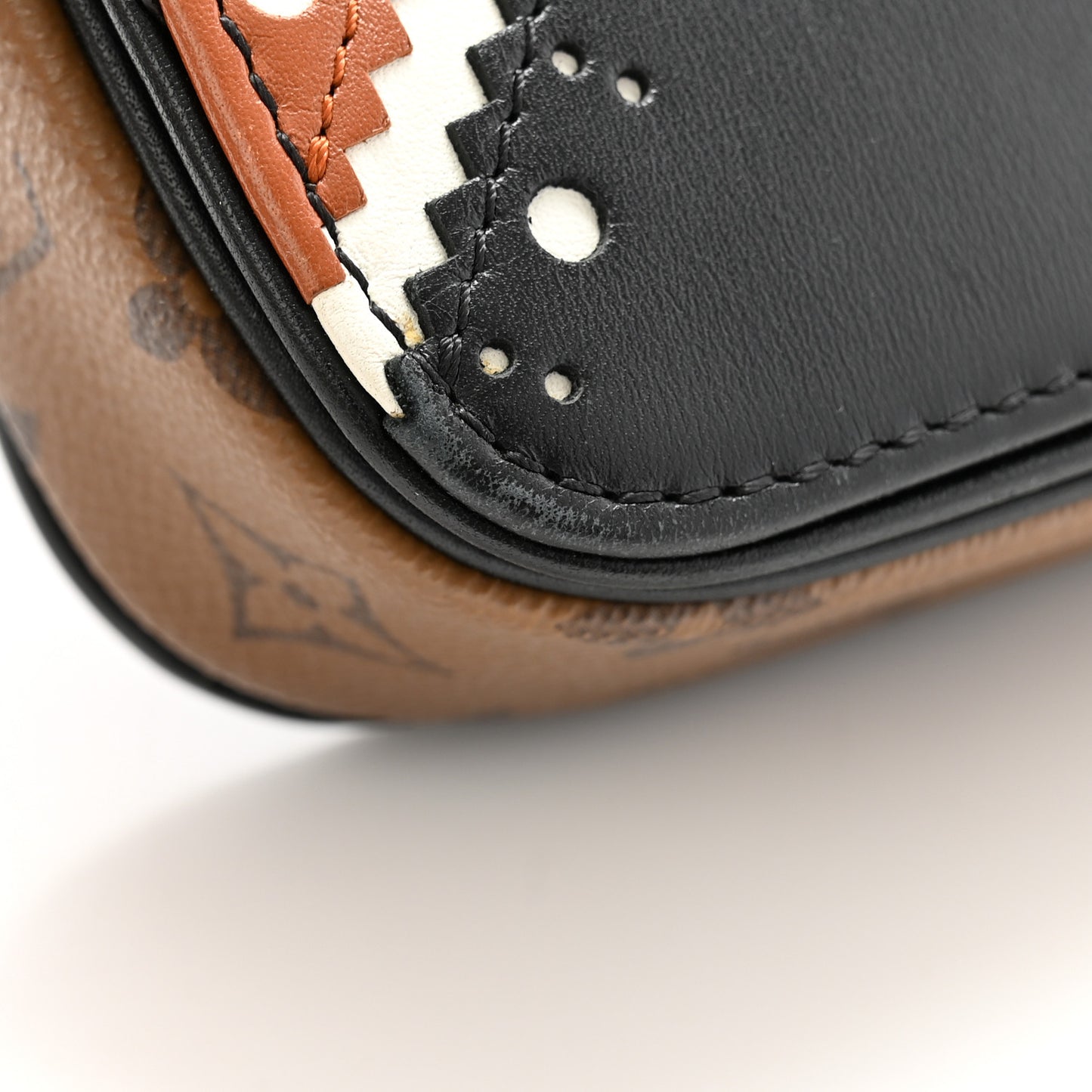 Monogram Brogue Pochette Metis