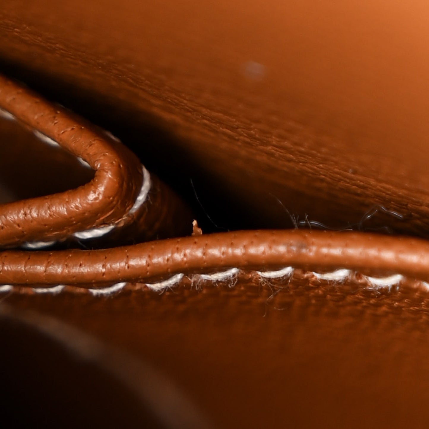 Togo Kelly Retourne 25 Gold