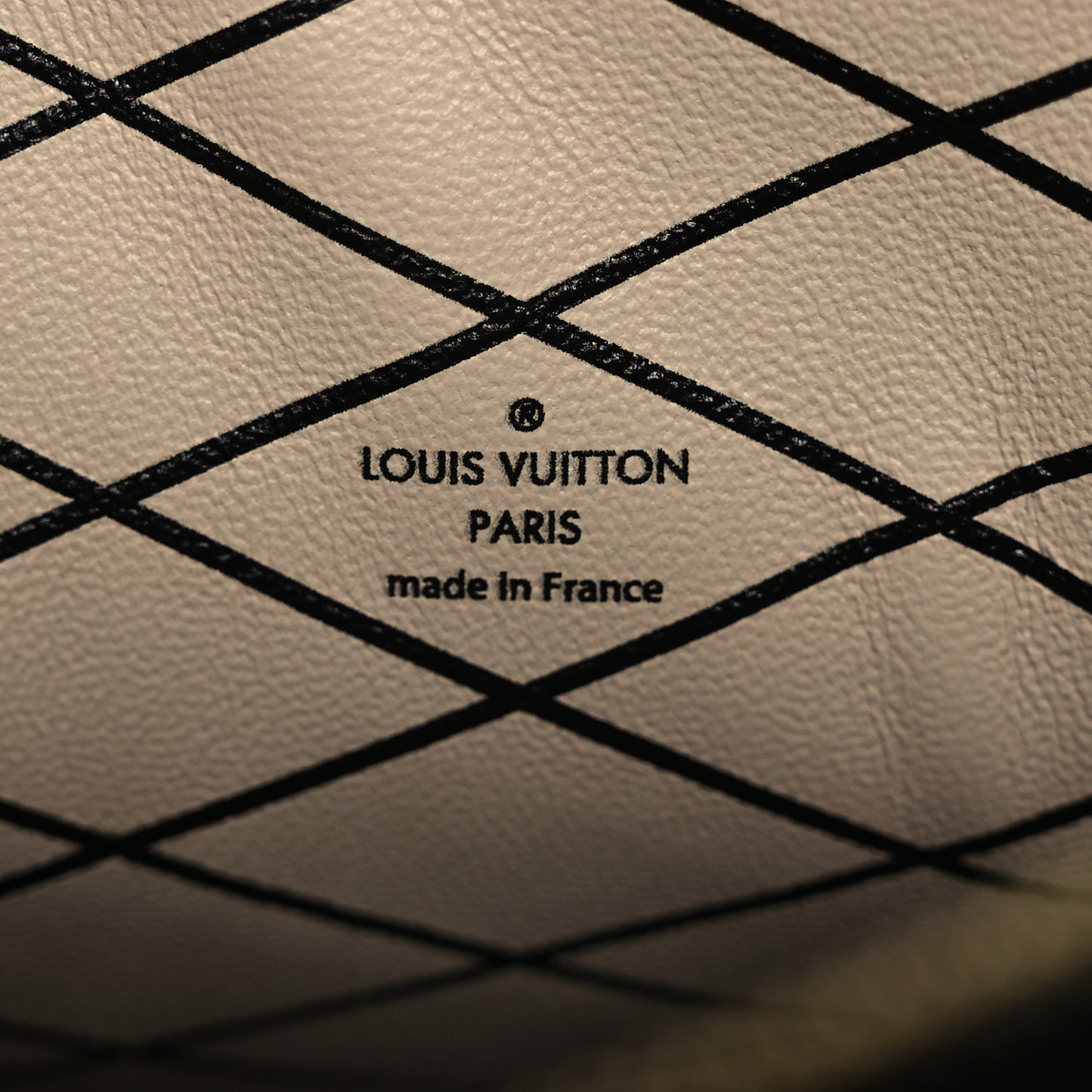 Reverse Monogram Trunk Clutch