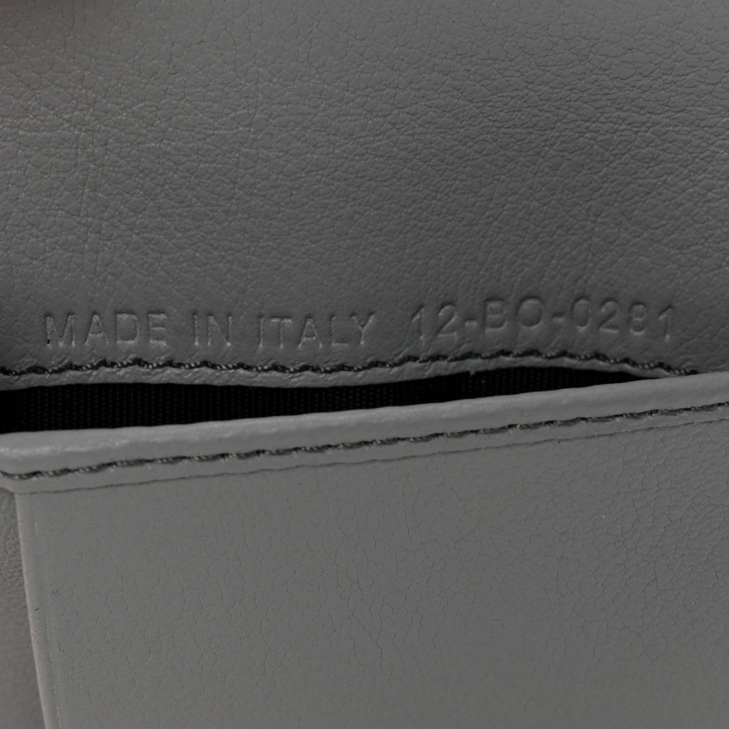 Calfskin Perforated Oblique Bi-Fold Card Holder Grey