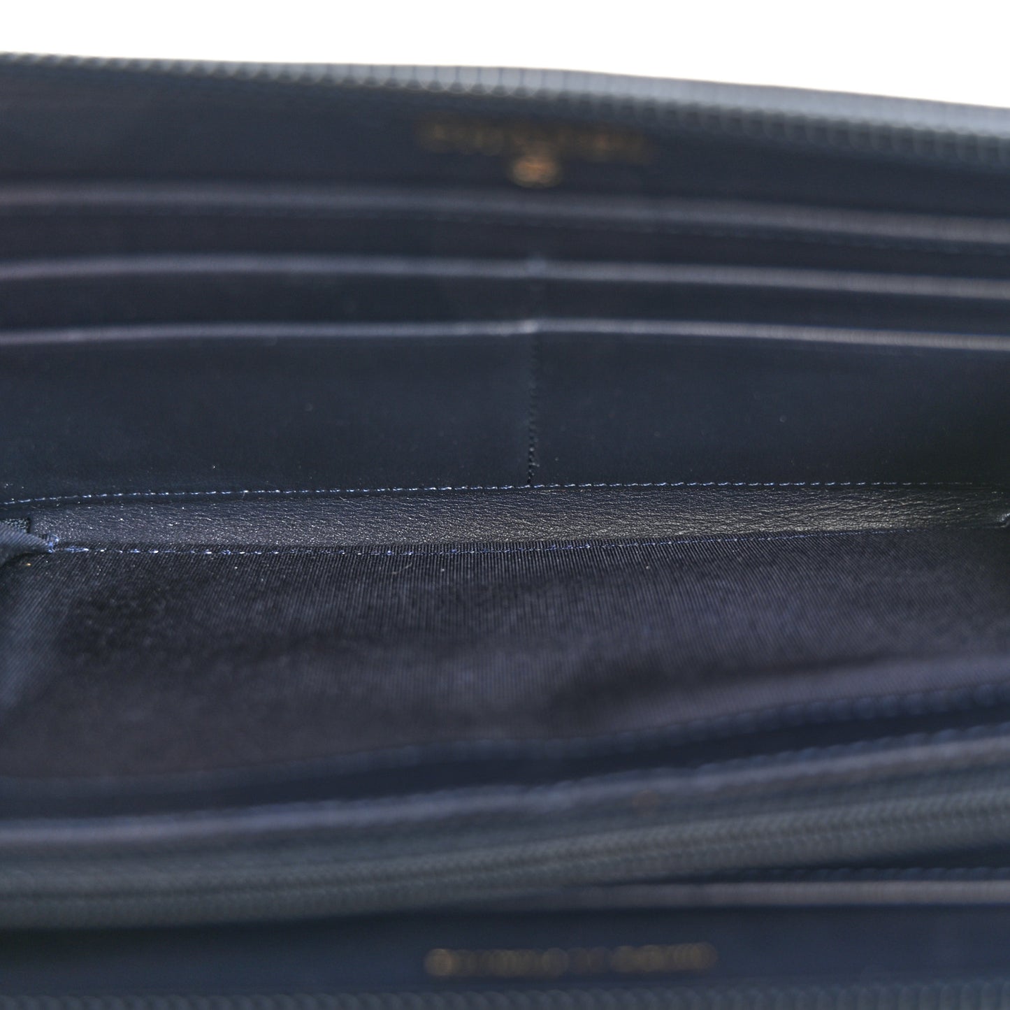 Caviar Chevron Quilted Zip Around Boy Wallet Navy