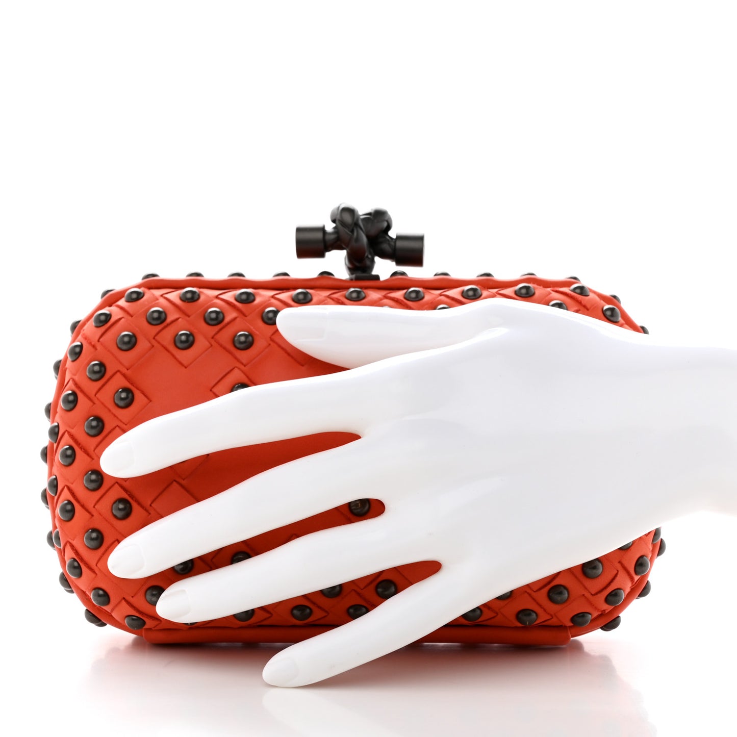 Waxy Nappa Intrecciato Knot Studded Clutch Orange