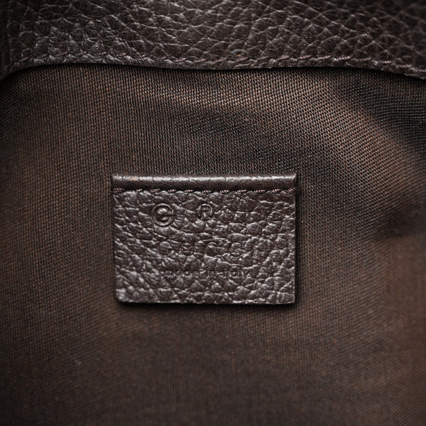 Monogram Dollar Calfskin O Drawstring Backpack Beige Ebony Testa di Moro Dark Chocolate