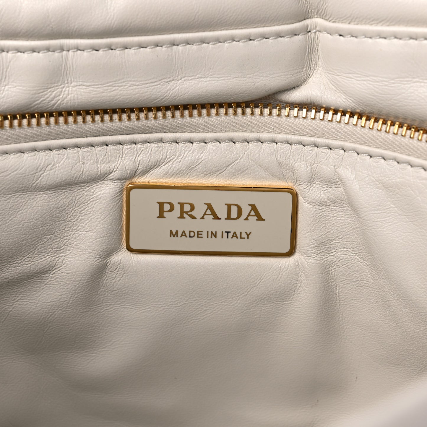 Nappa Soft Padded Logo Embossed Triangle Quilted Shoulder Bag White