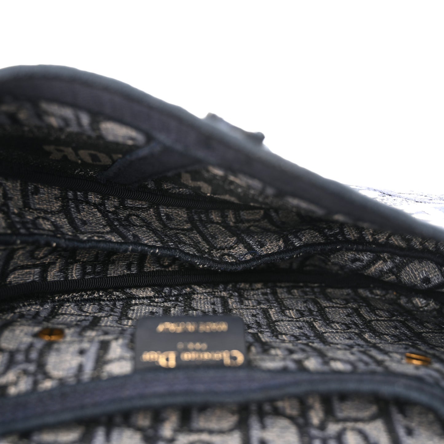 Oblique Embroidered Saddle Bag Blue