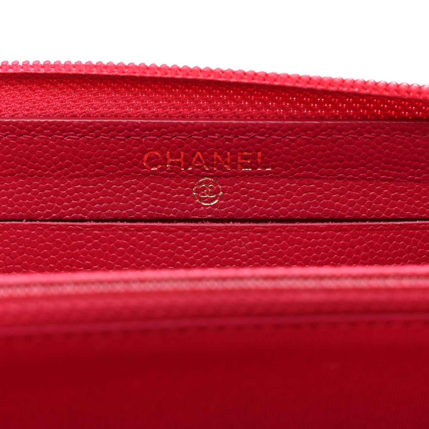 Caviar Quilted Small Boy Zip Around Wallet Fuchsia