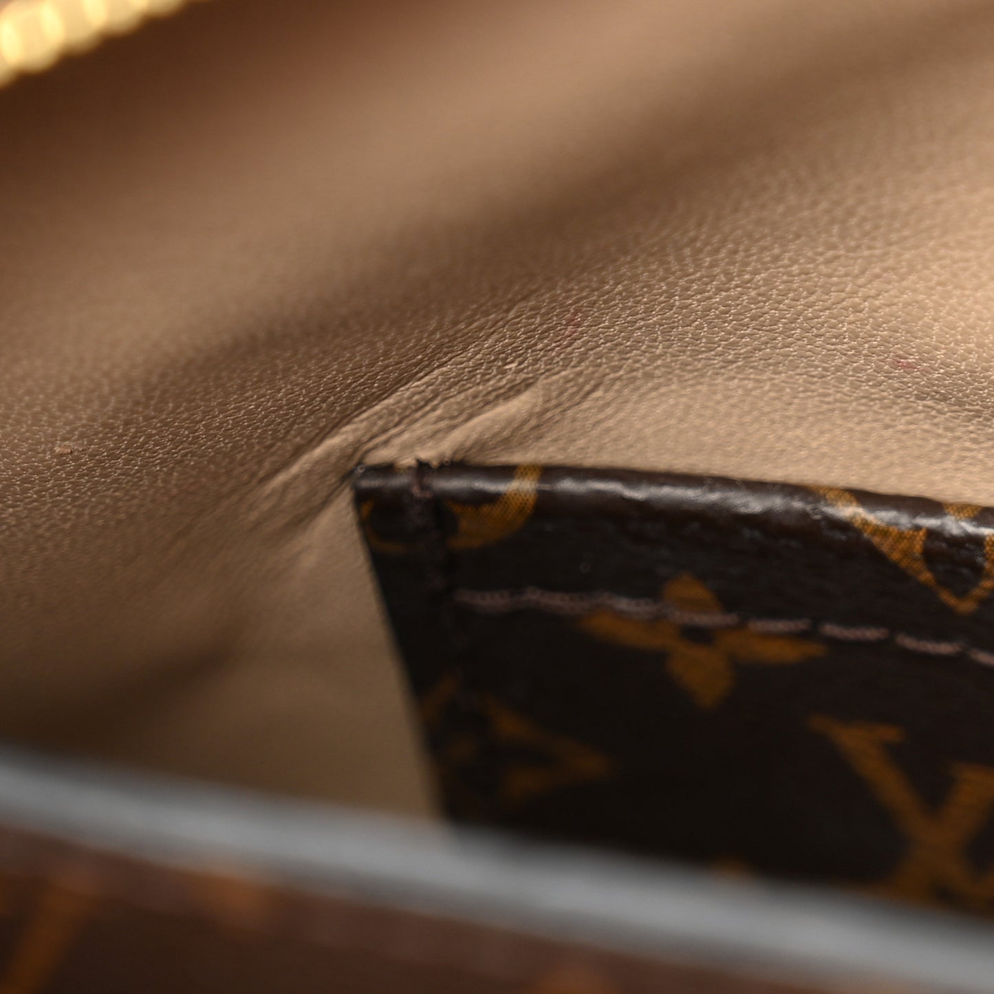 Reverse Monogram Trunk Clutch