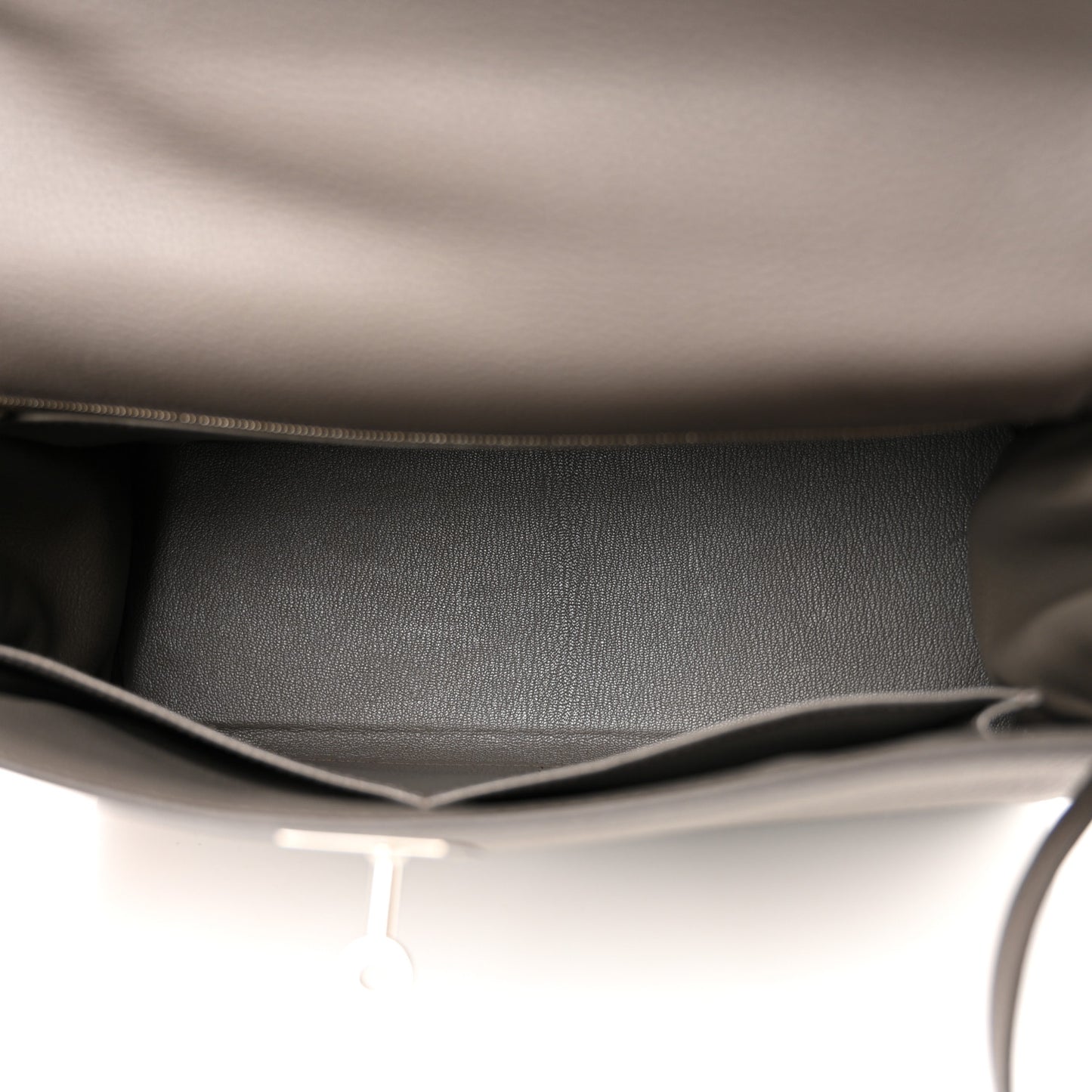 Togo Kelly Retourne 32 Etain