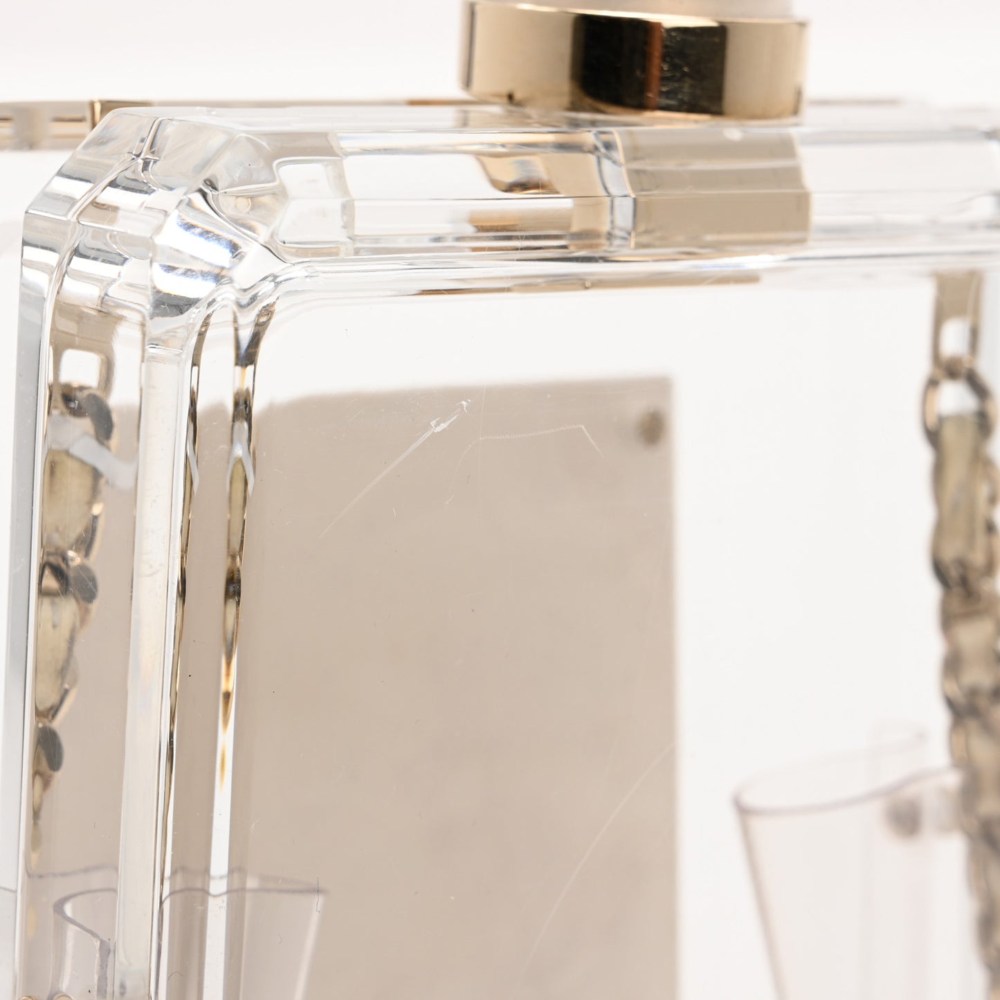 Transluscent Plexiglass Perfume Bottle Clutch