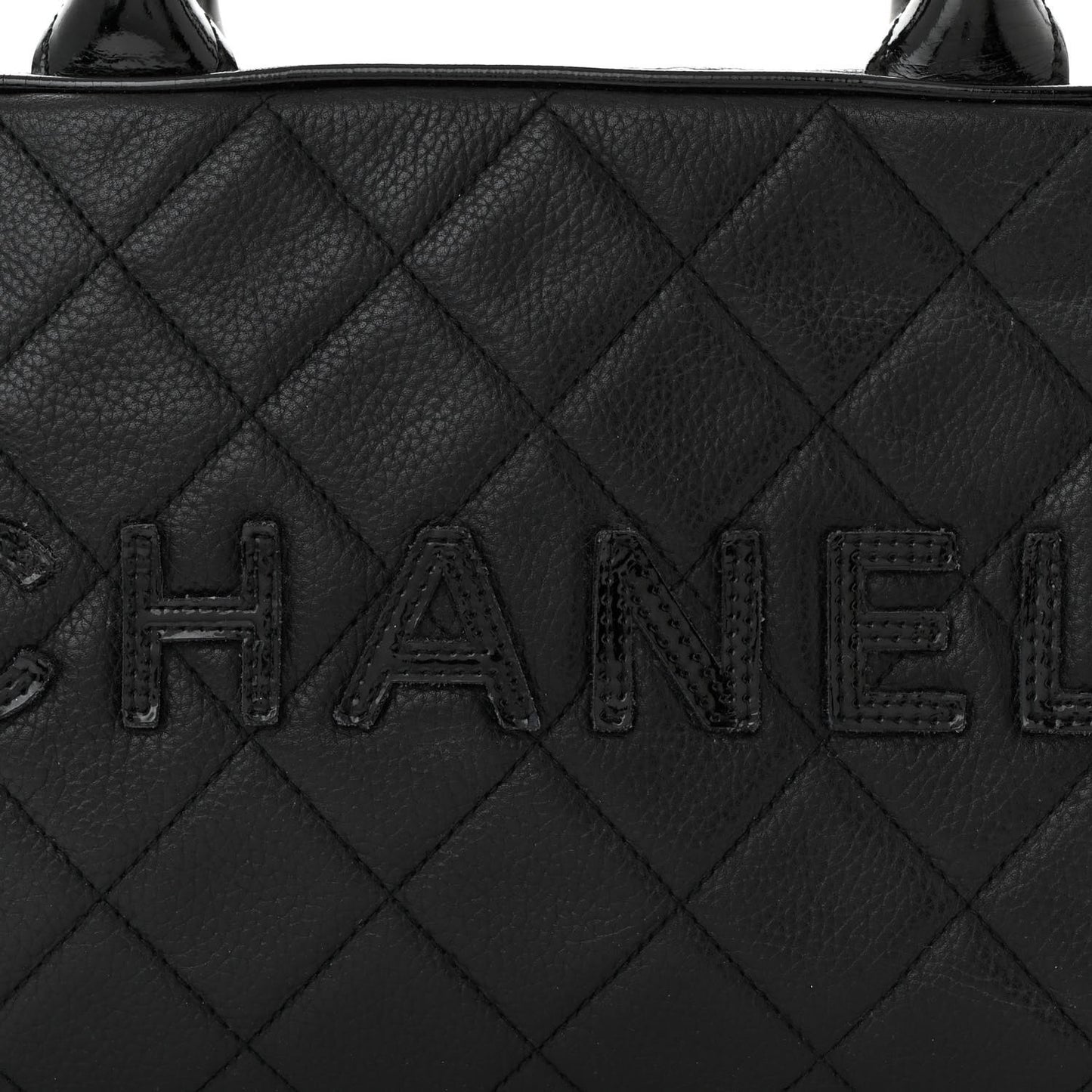 Caviar Patent Quilted Bowler Black