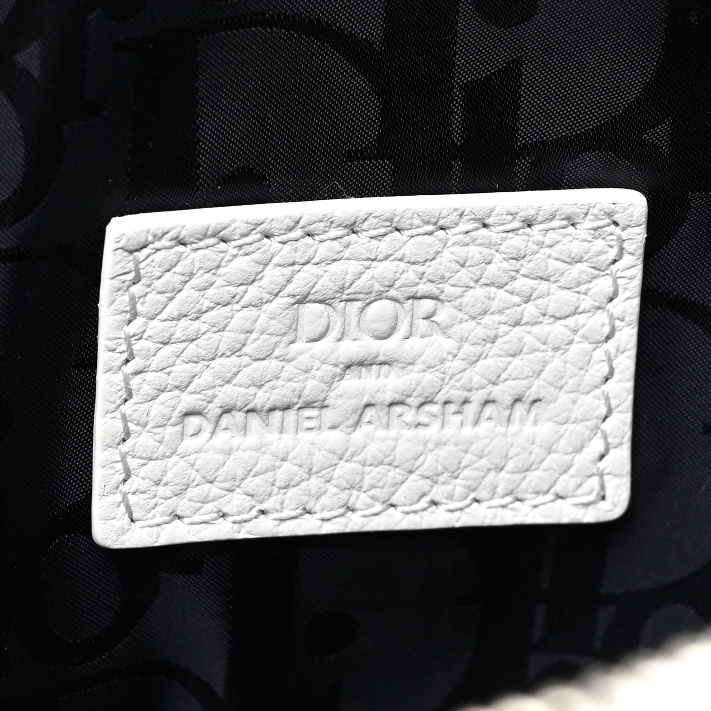 X Daniel Arsham Grained Calfskin Newspaper Print Saddle Bag White