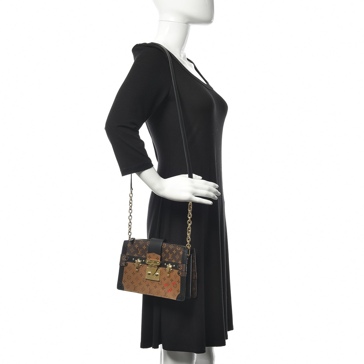 Reverse Monogram Trunk Clutch
