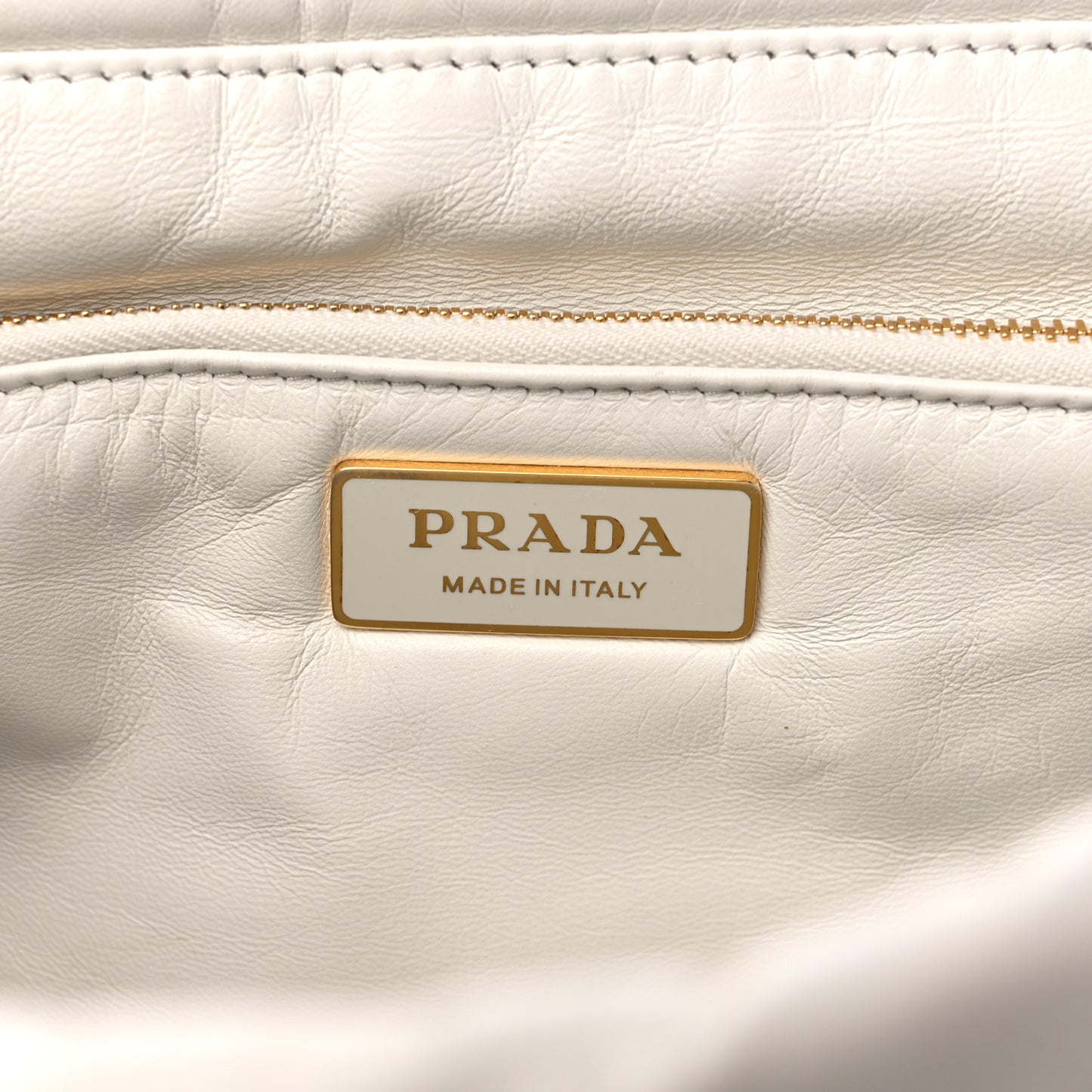 Nappa Soft Padded Logo Embossed Triangle Quilted Shoulder Bag White