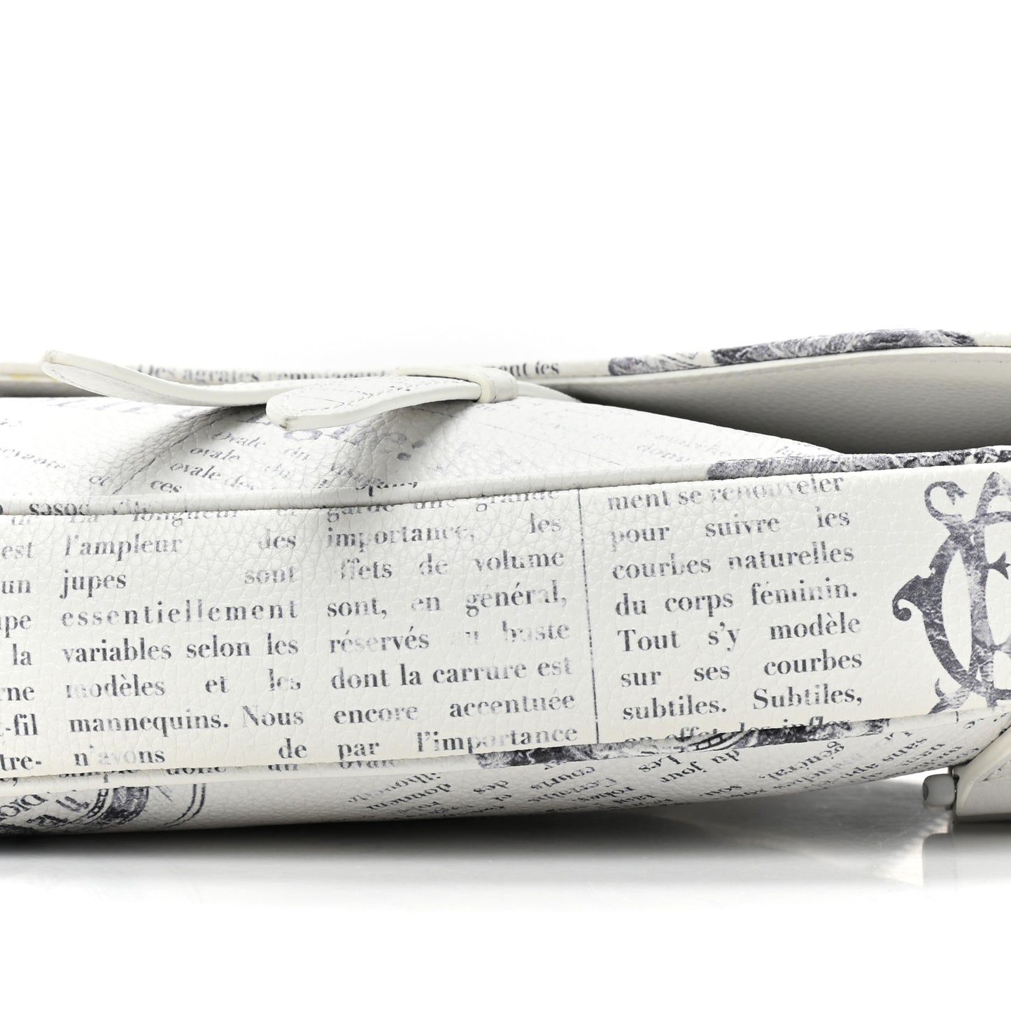 X Daniel Arsham Grained Calfskin Newspaper Print Saddle Bag White