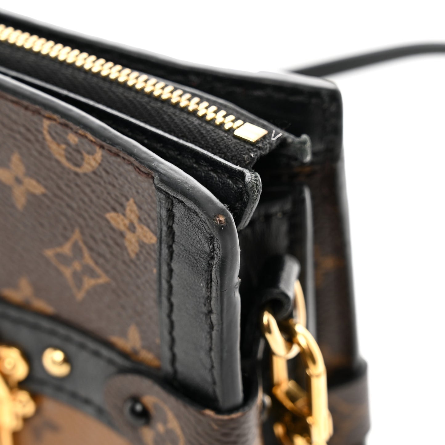 Reverse Monogram Trunk Clutch