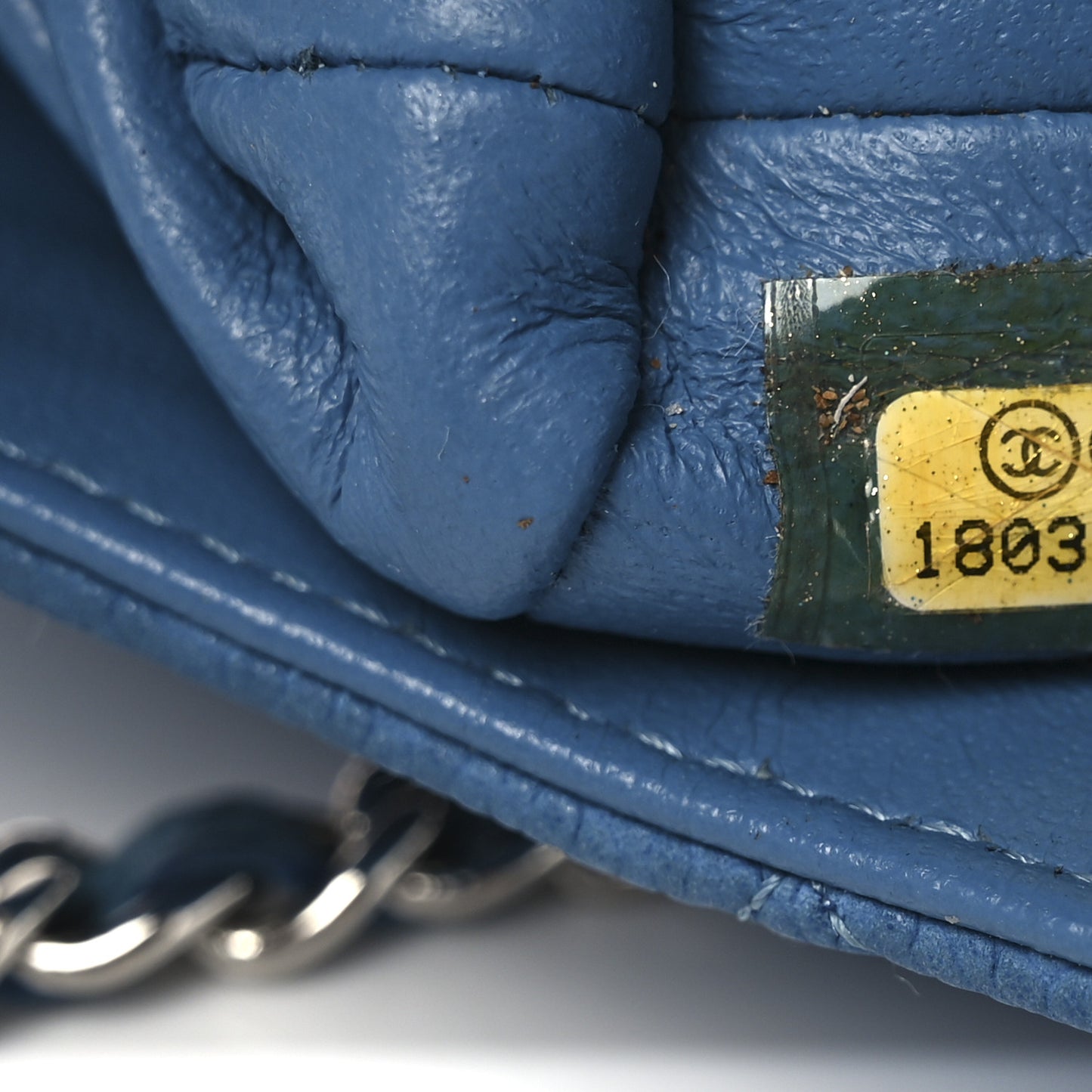 Iridescent Caviar Quilted Clutch With Chain Flap Blue