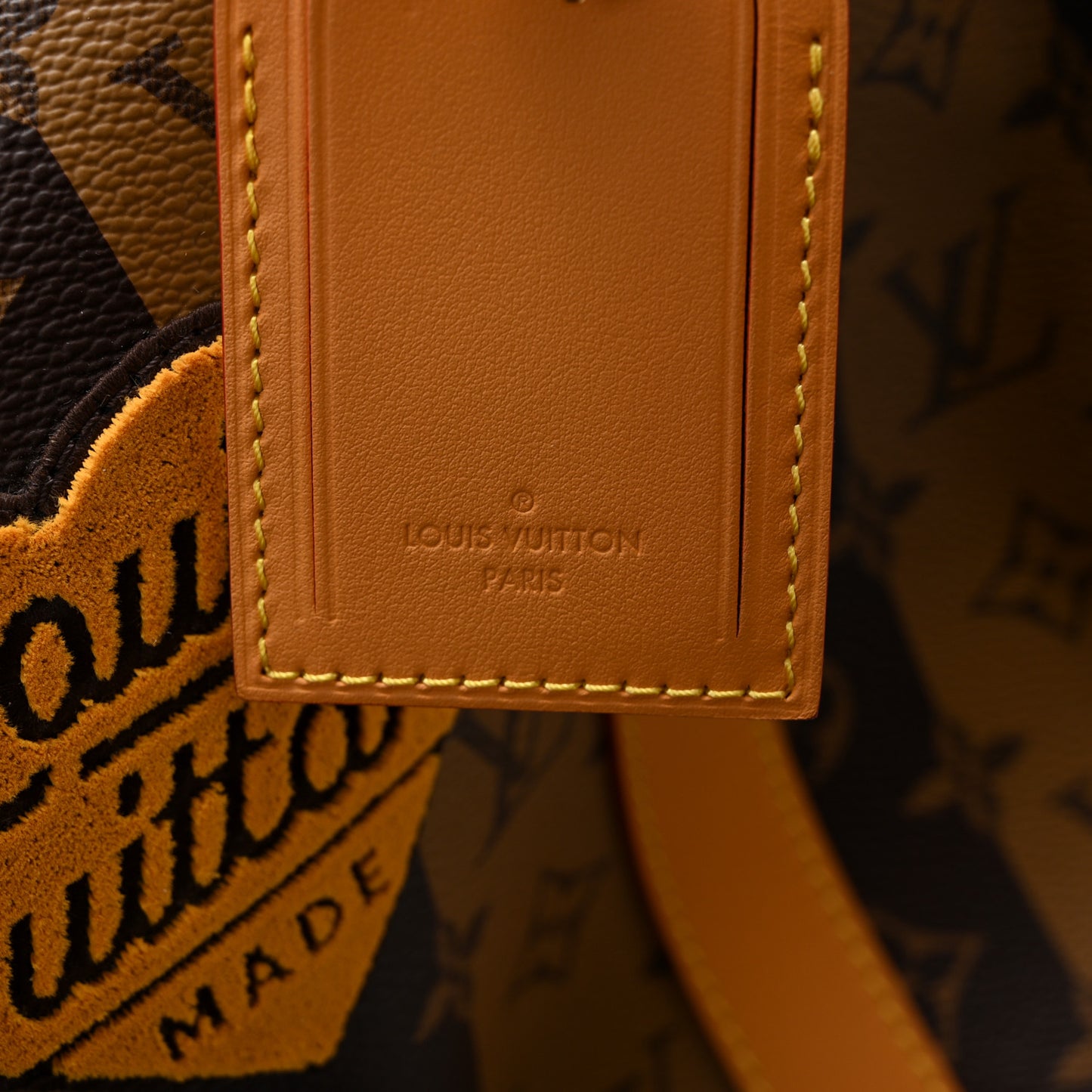 X NIGO Reverse Monogram Stripe Keepall Bandouliere 50 Brown