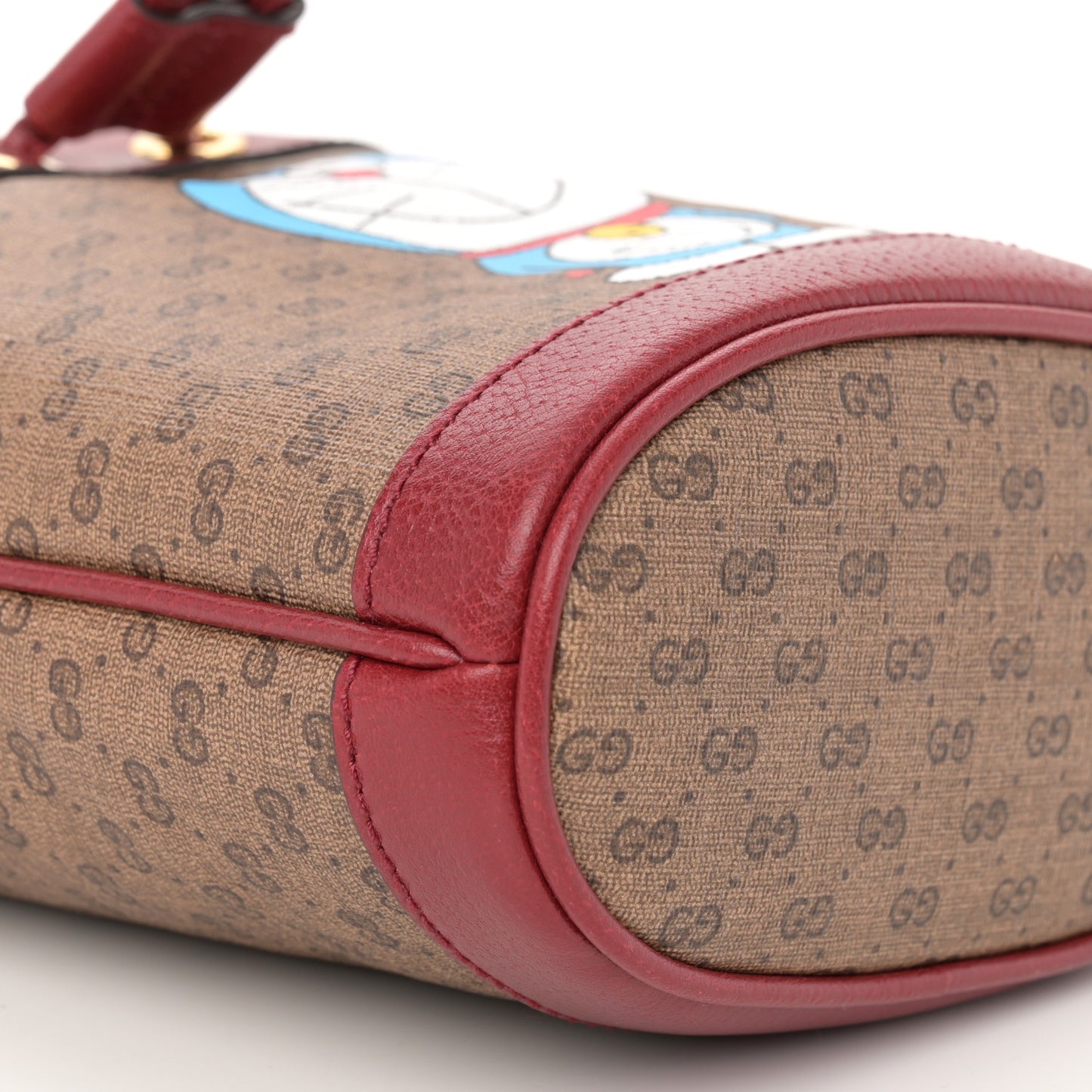 X DORAEMON Mini Vintage GG Supreme Monogram Textured Dollar Calfskin Mini Bucket Bag Beige Ebony Multicolor New Cherry Red