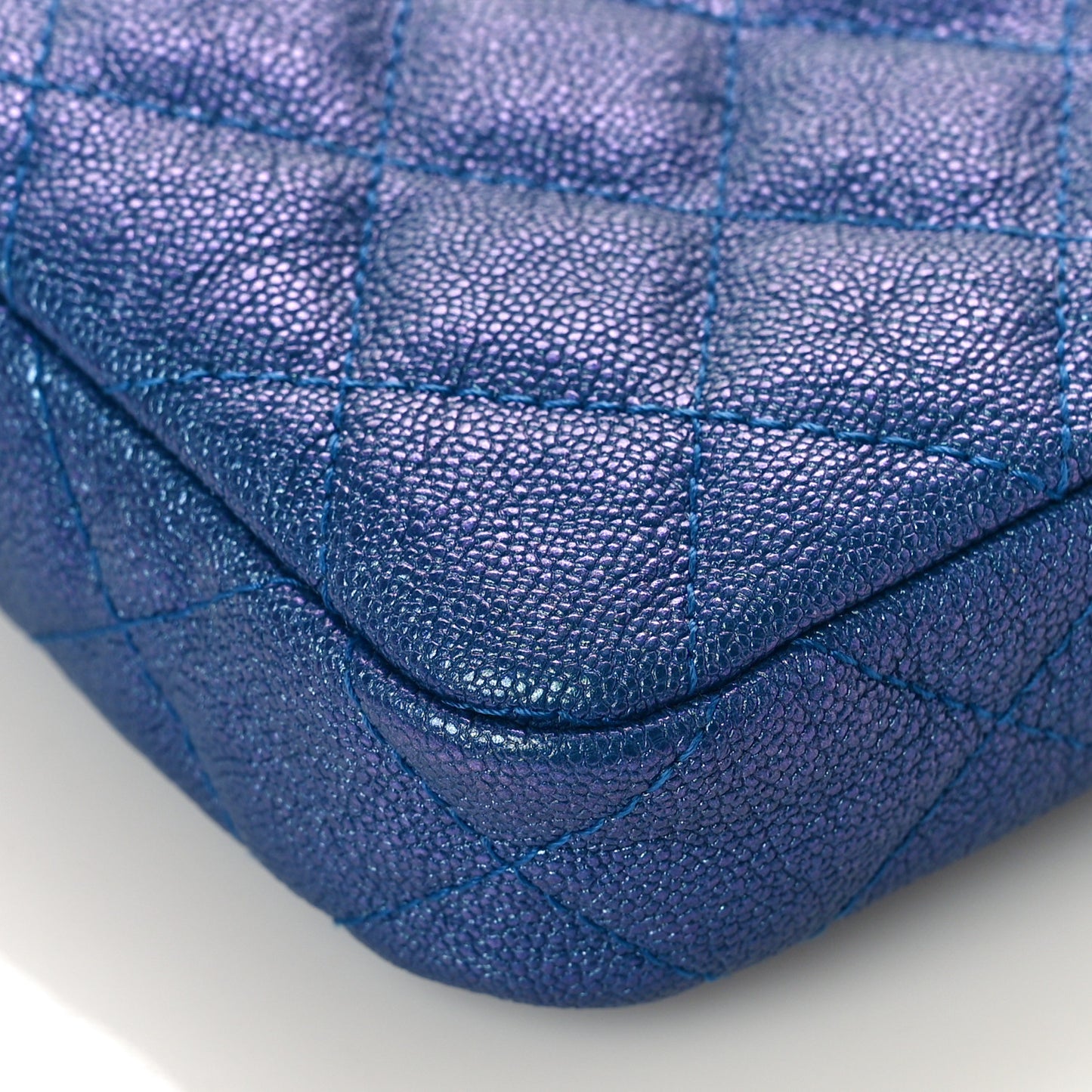 Iridescent Caviar Quilted Clutch With Chain Dark Blue