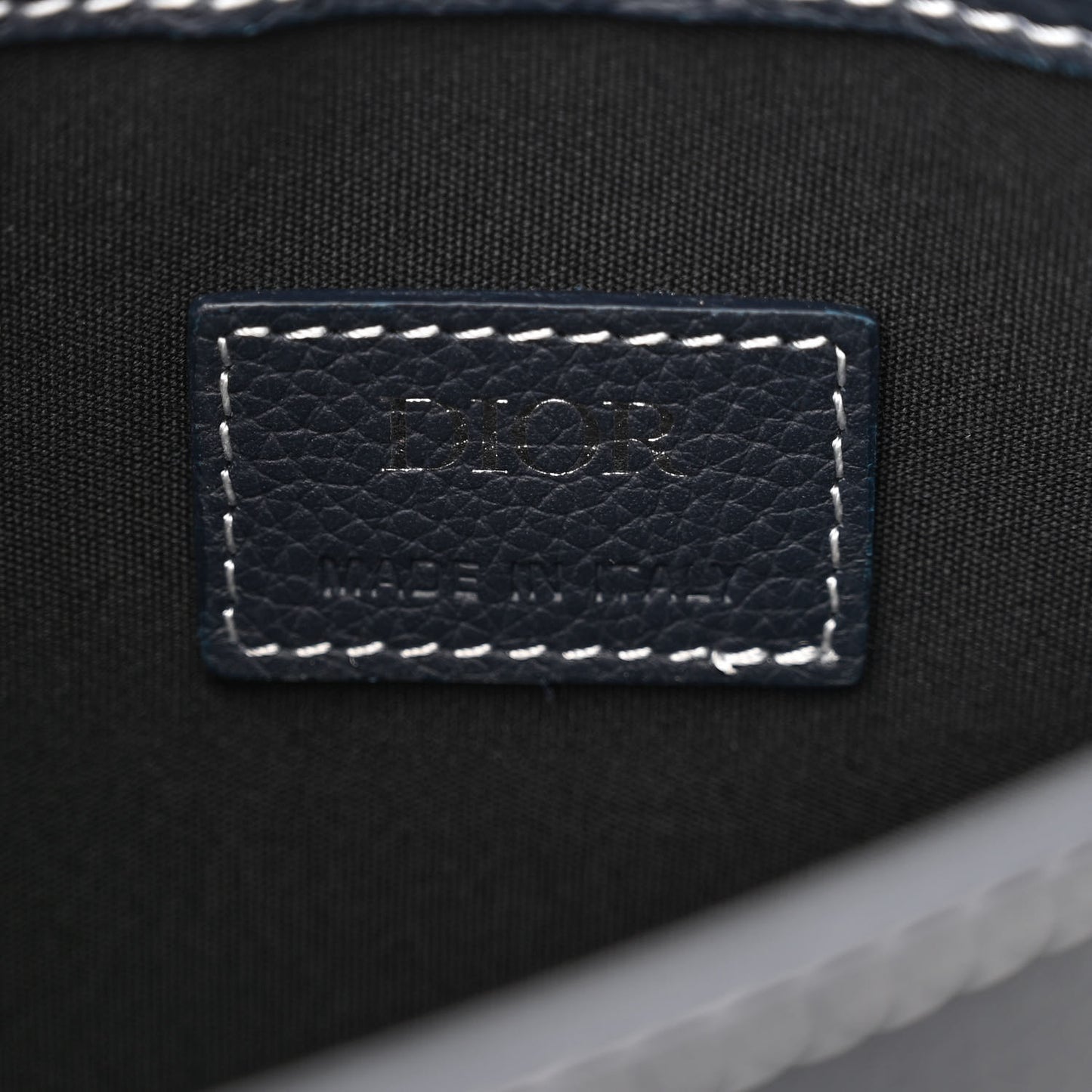 X KAWS Grained Calfskin Saddle Pouch Navy Blue