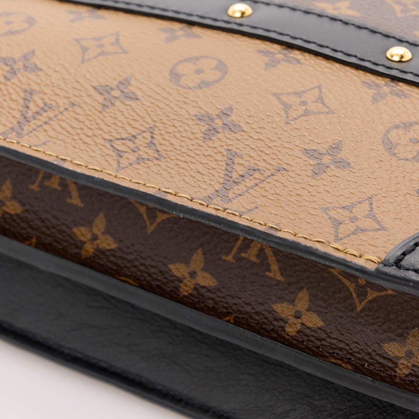 Reverse Monogram Trunk Clutch