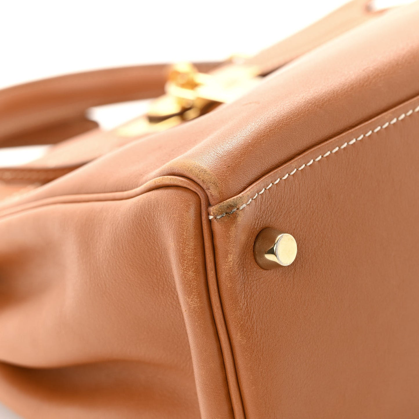 Swift Kelly Retourne 28 Gold