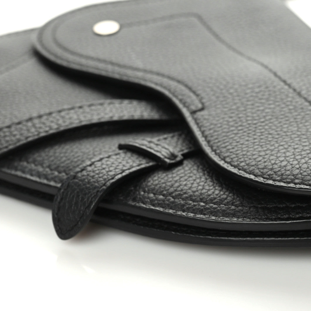 X KAWS Grained Calfskin Saddle Wristlet Black