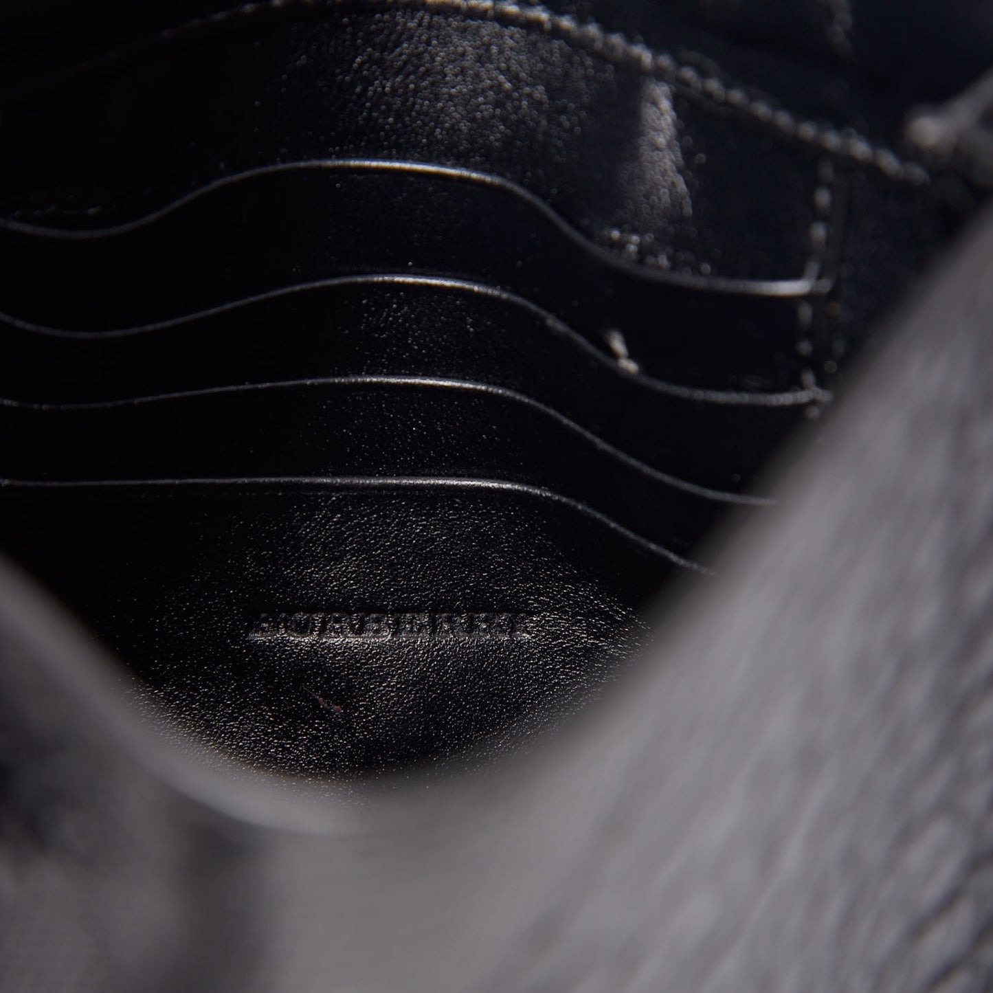 Signature Grain Calfskin Check Embossed Langley Crossbody Black