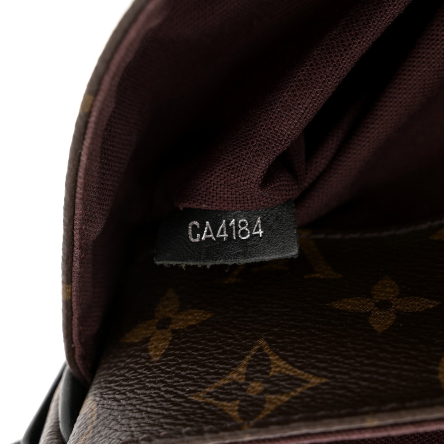 Monogram Macassar District PM