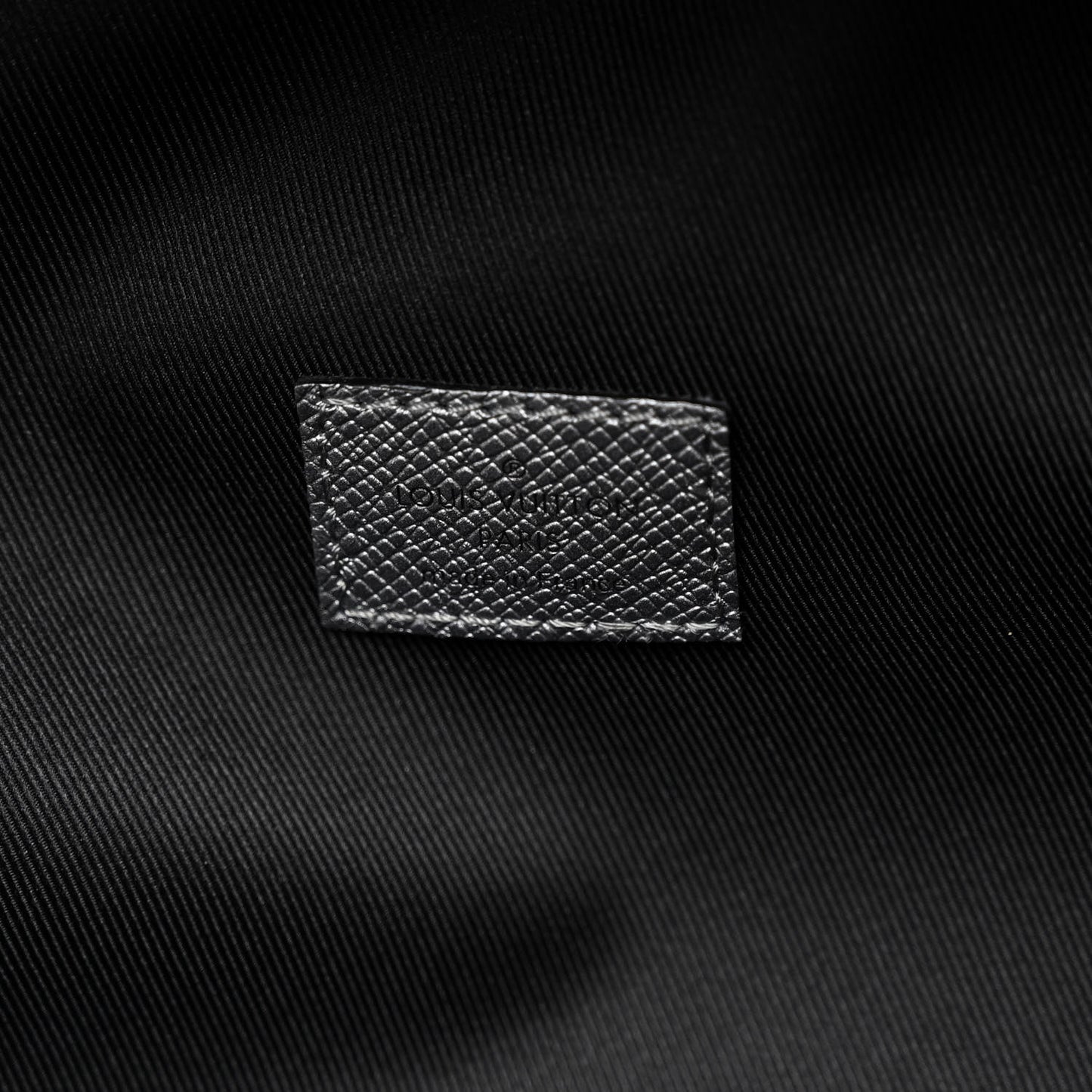 Monogram Taiga Discovery Backpack PM Silver