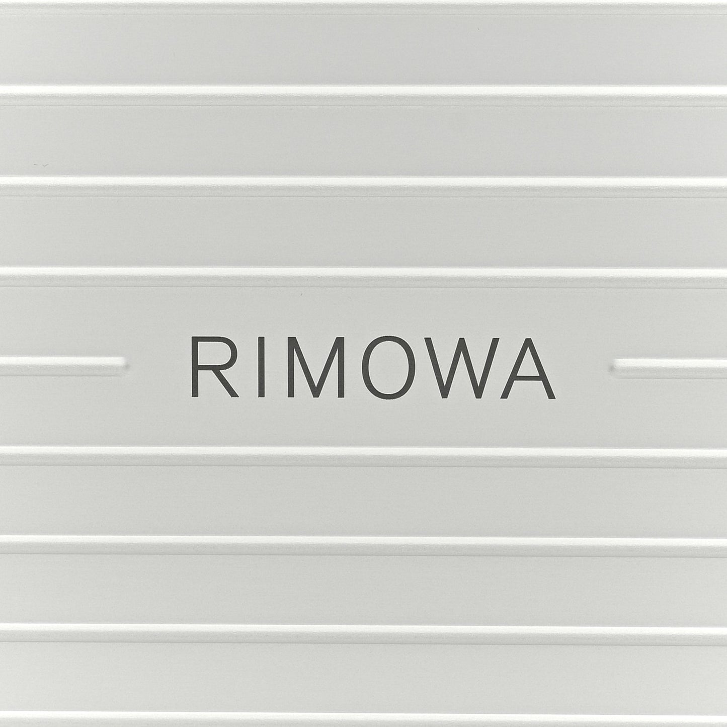 X RIMOWA Aluminum Personal Clutch On Strap Silver
