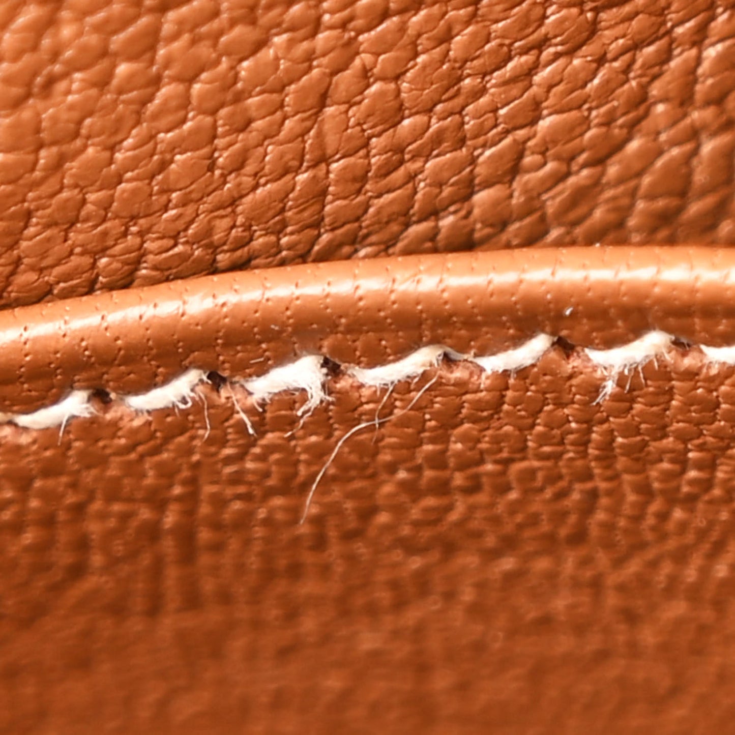 Togo Kelly Retourne 25 Gold