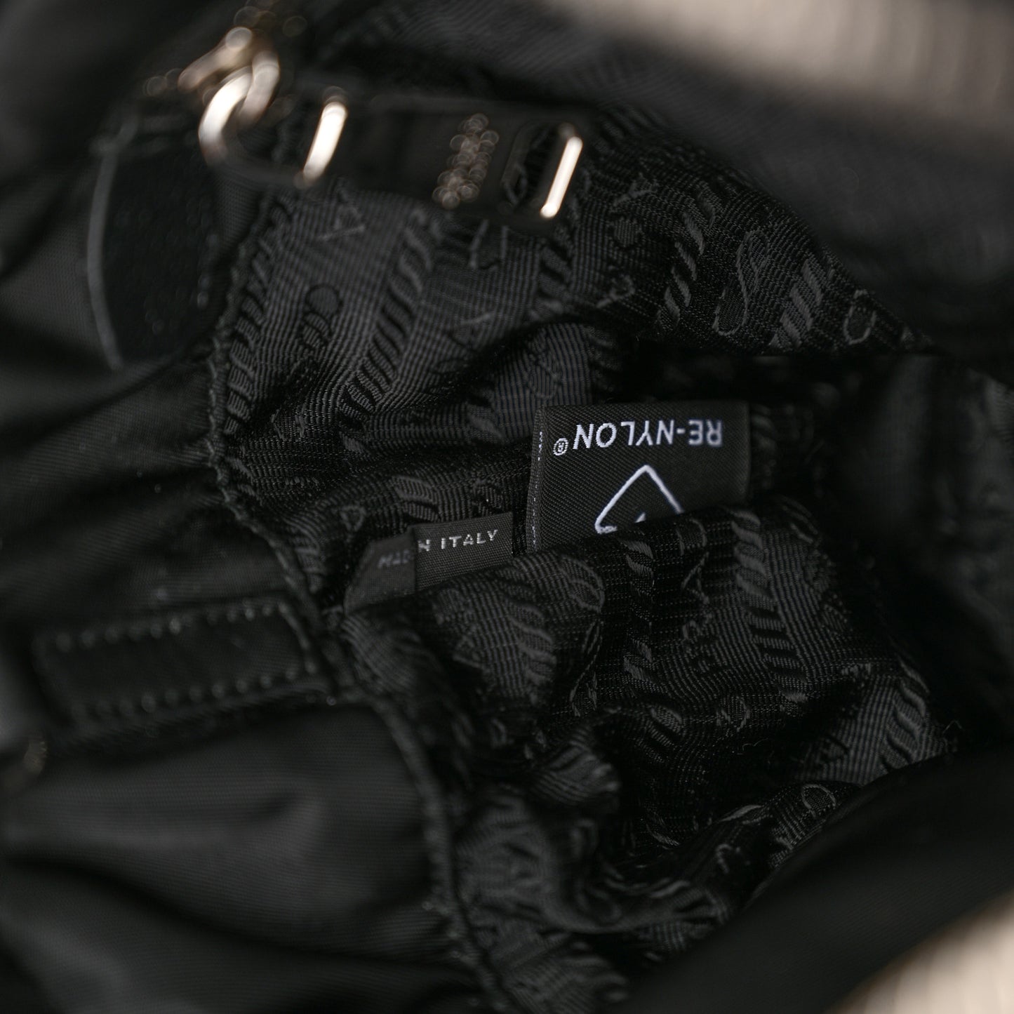 Re-Nylon Nappa Triangle Quilted Padded Double Handled Zip Pocket Tote Black