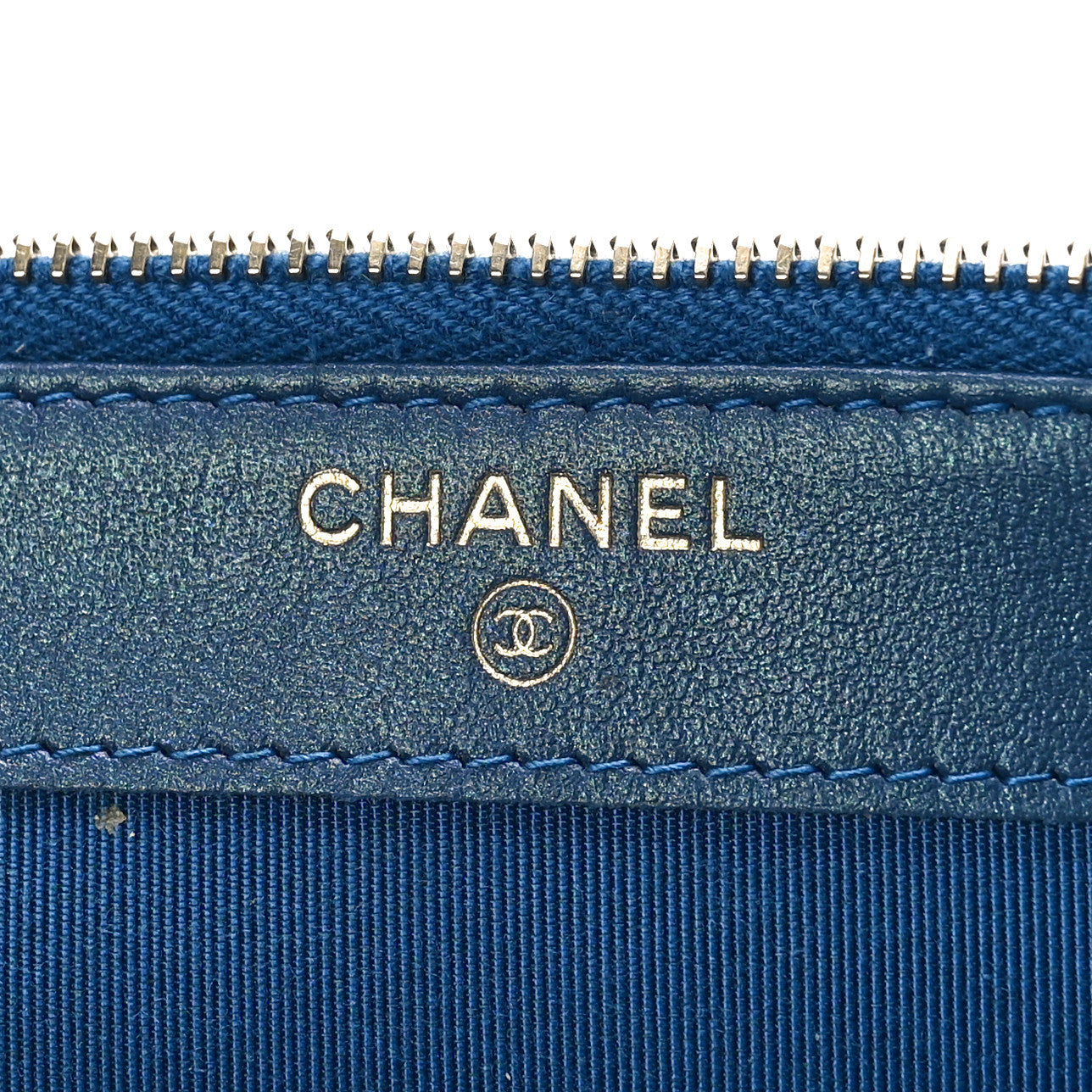 Iridescent Caviar Quilted Clutch With Chain Dark Blue