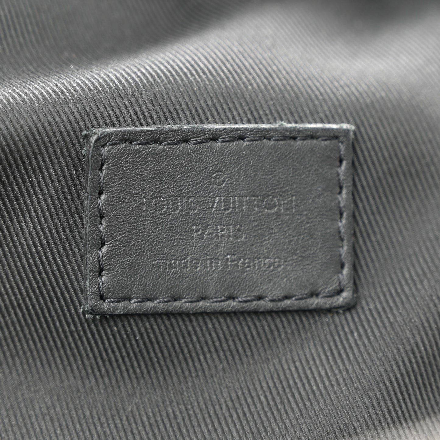 Damier Infini Avenue Sling Backpack Onyx