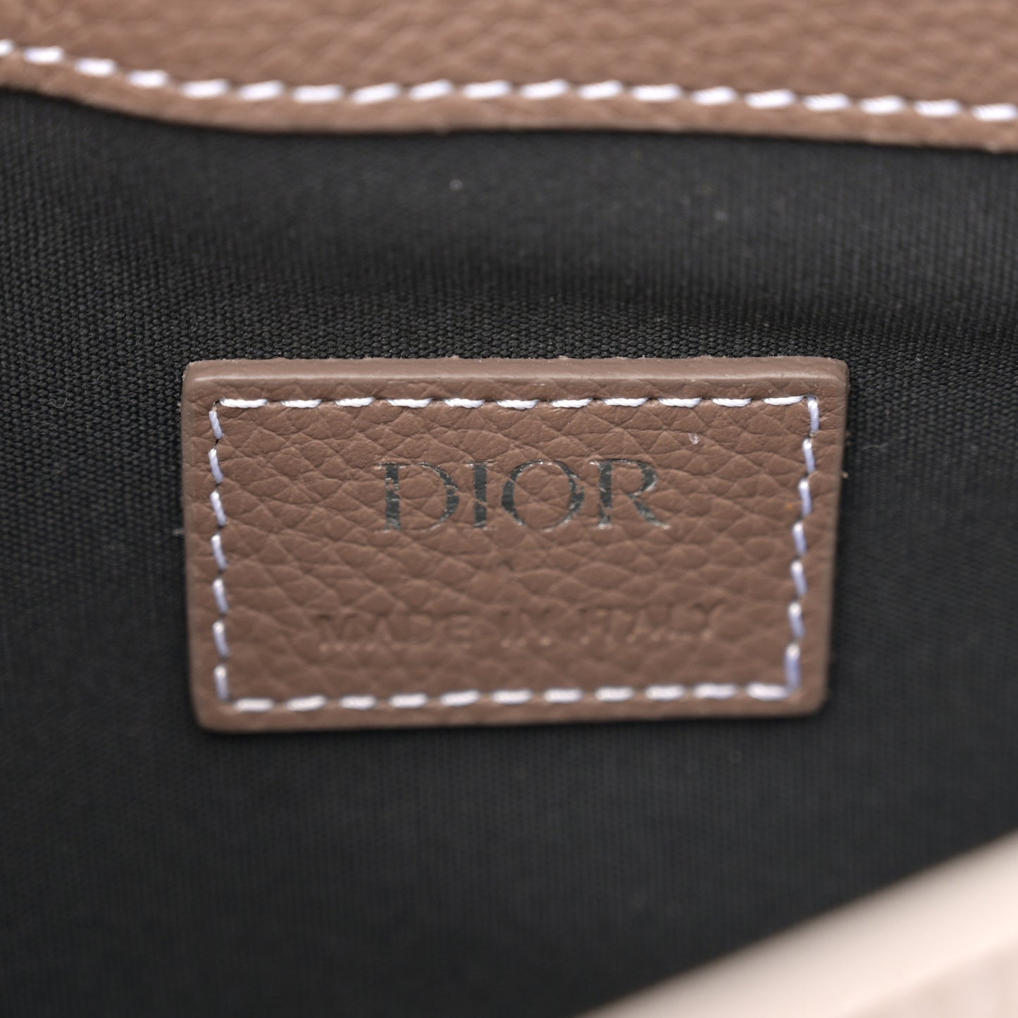 X KAWS Grained Calfskin Saddle Pouch Marron Multicolor