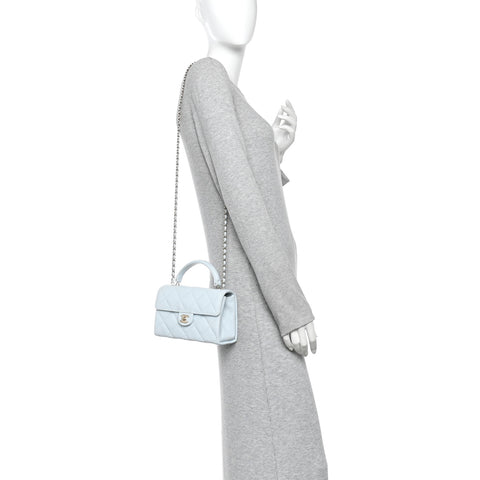 Caviar Quilted Mini Retro Twist Top Handle Flap Light Blue