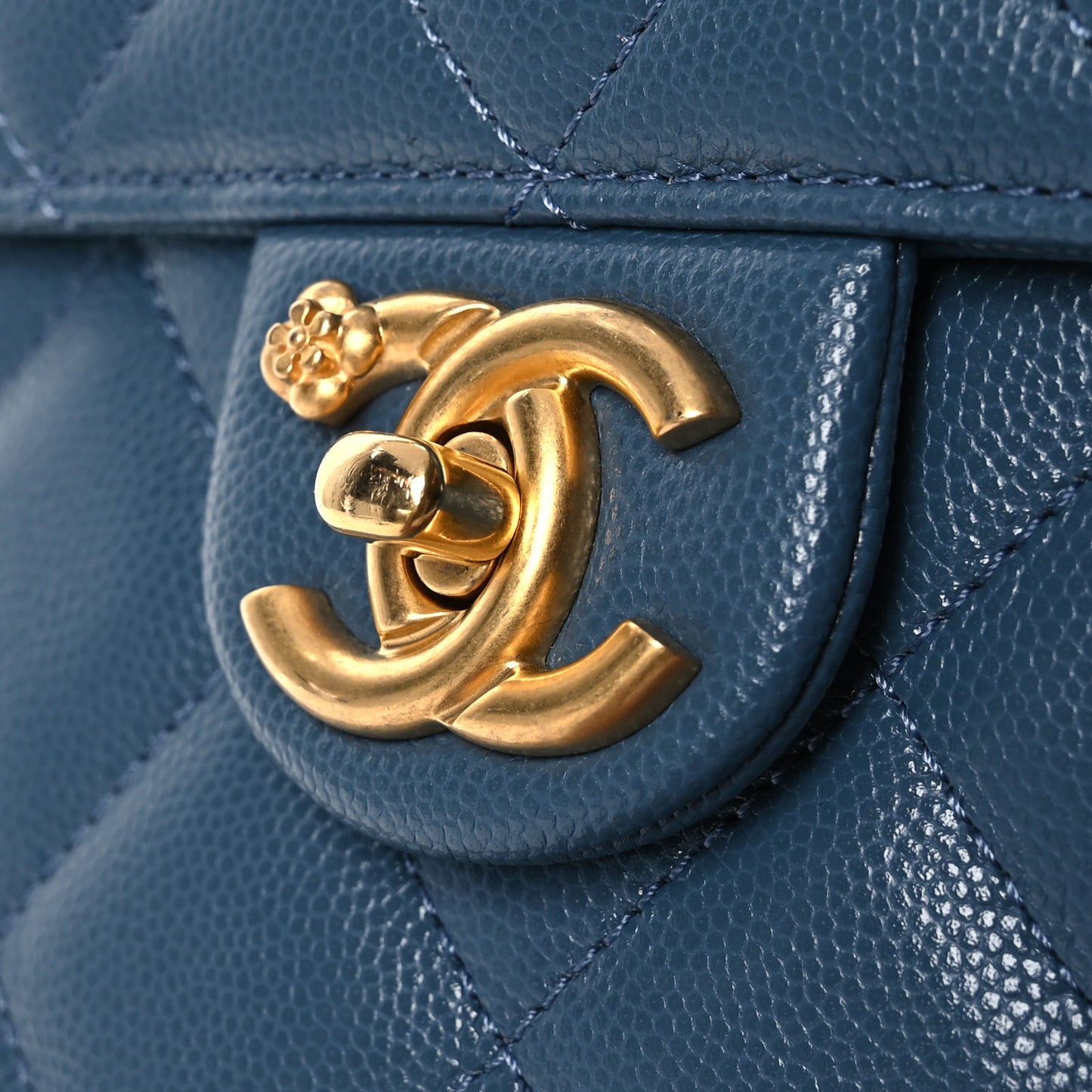 Caviar Quilted Camellia Chain Around Backpack Blue