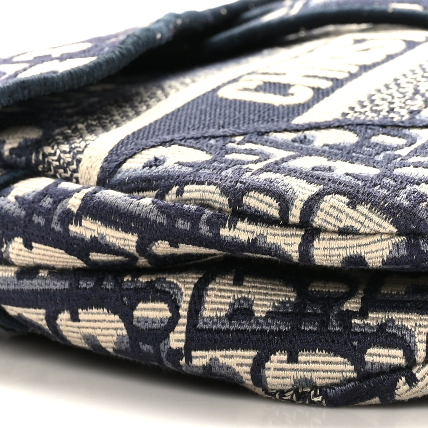 Oblique Embroidered Saddle Bag Blue