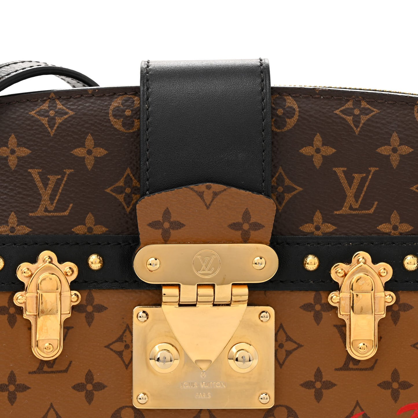 Reverse Monogram Trunk Clutch