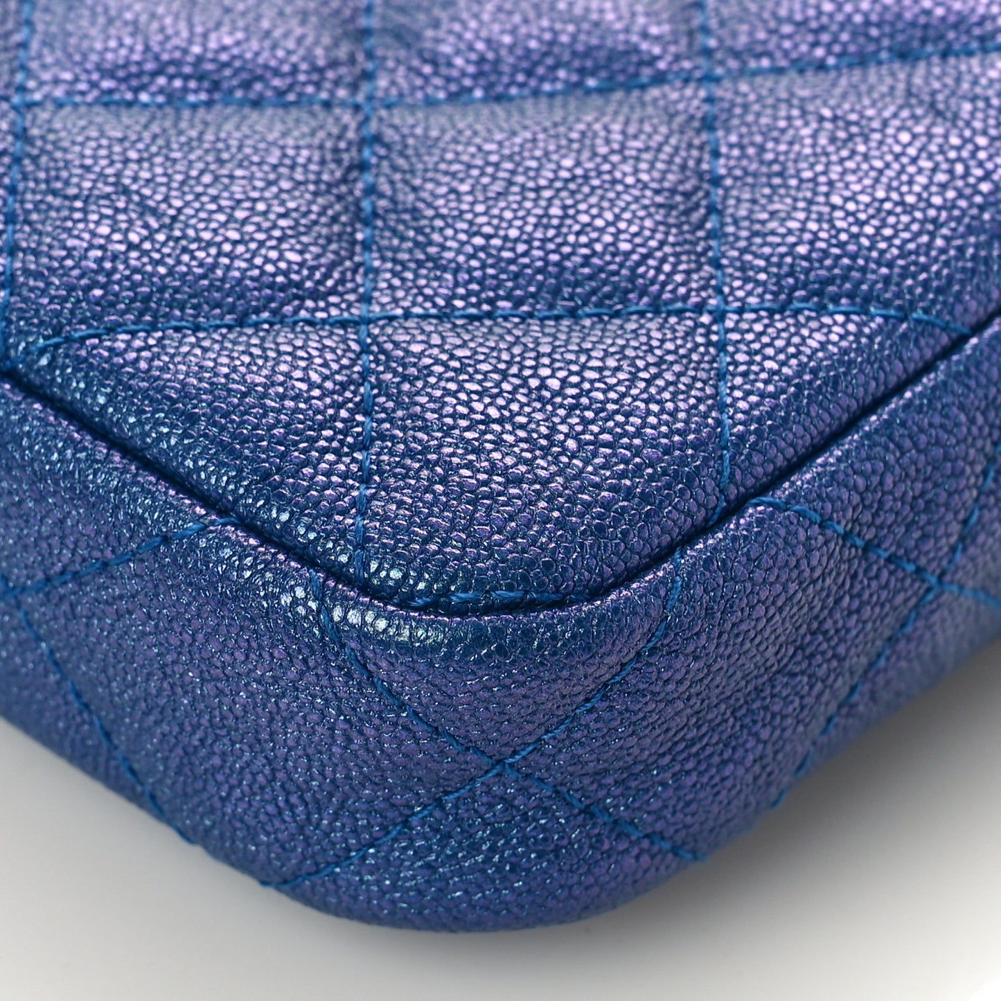 Iridescent Caviar Quilted Clutch With Chain Dark Blue