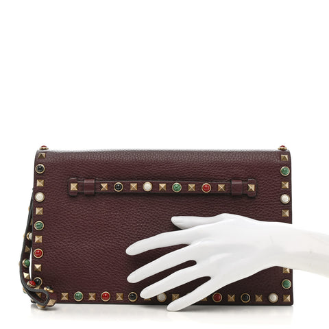 Pebbled Calfskin Rockstud Rolling Wristlet Clutch Rubin