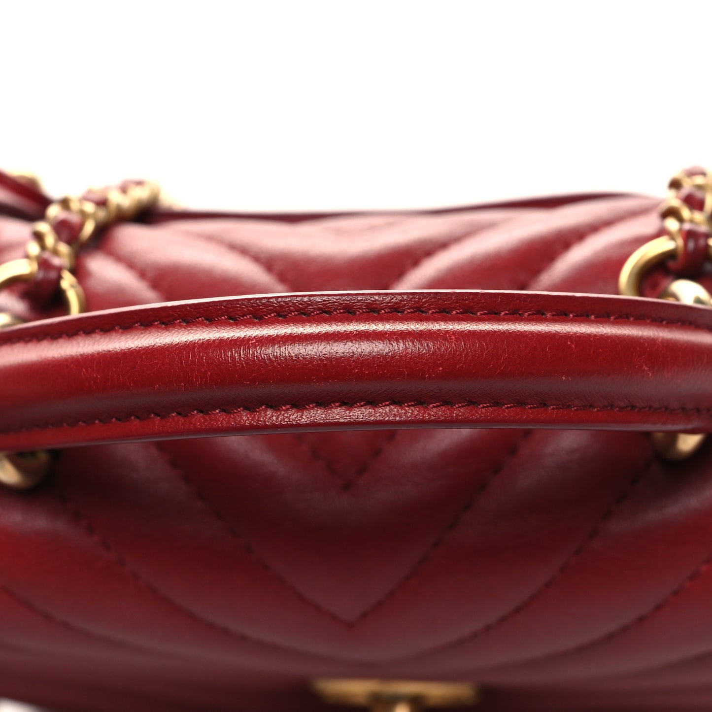 Lambskin Reverse Chevron Quilted Mini Round Top Handle Flap Red