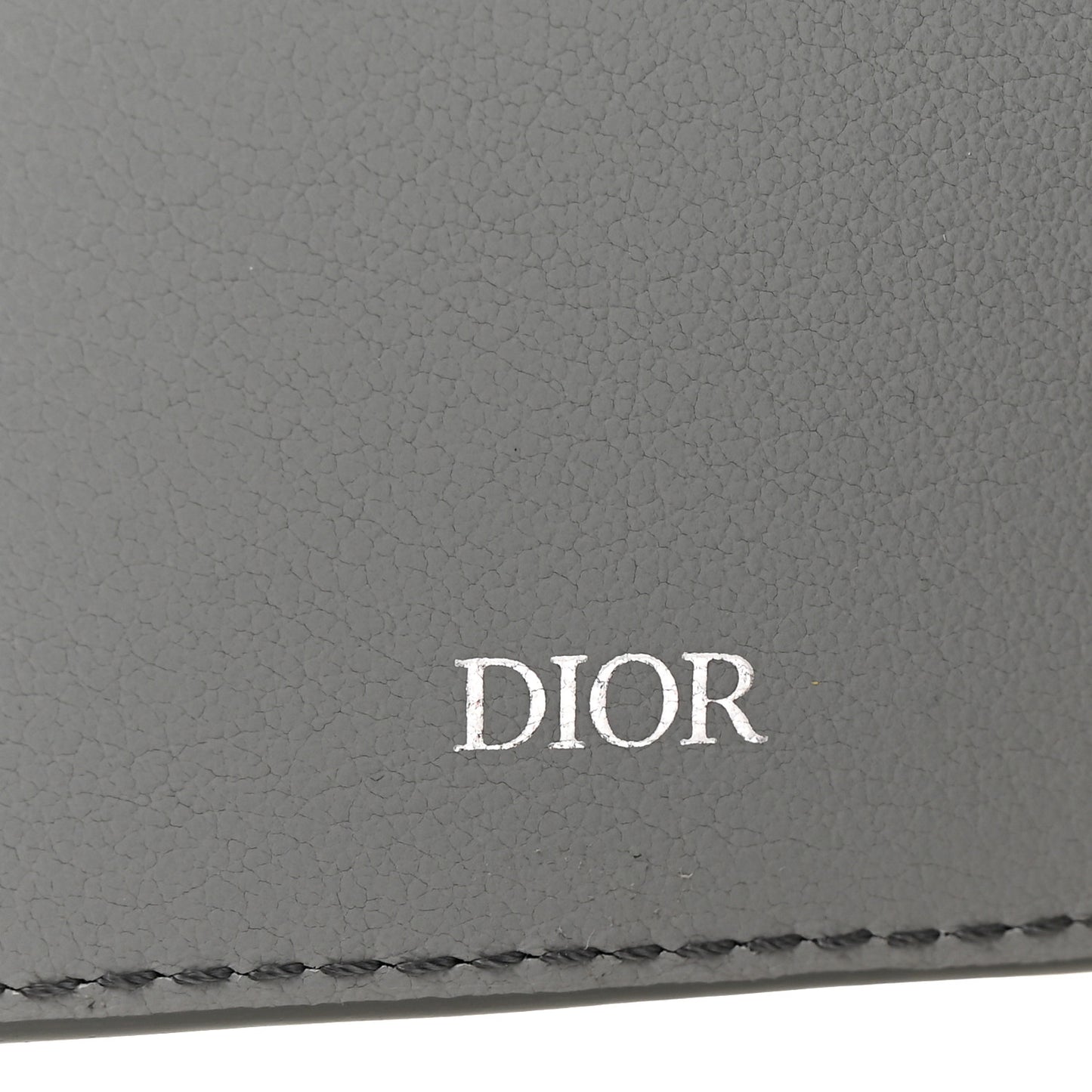 Calfskin Perforated Oblique Bi-Fold Card Holder Grey