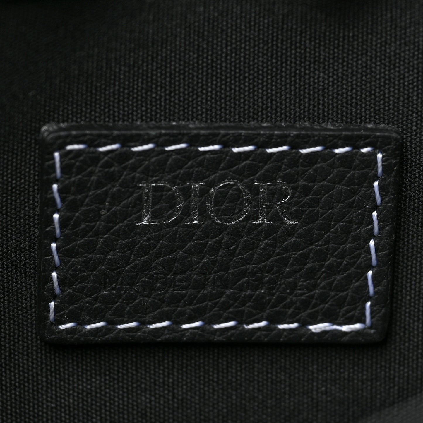 X KAWS Grained Calfskin Saddle Pouch Black