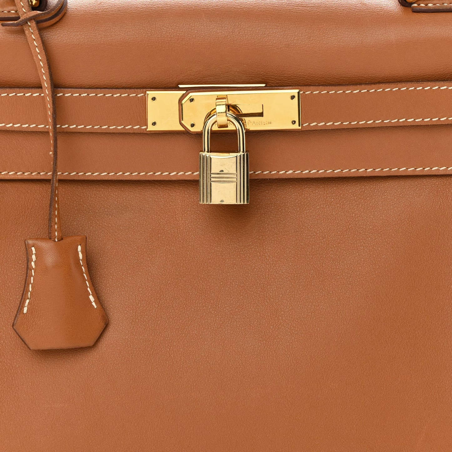 Swift Kelly Retourne 28 Gold