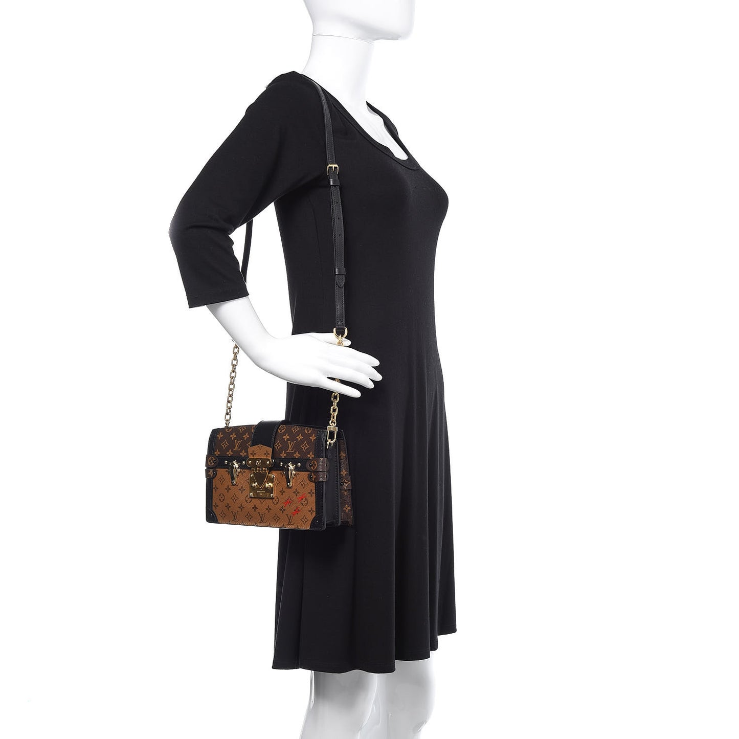 Reverse Monogram Trunk Clutch