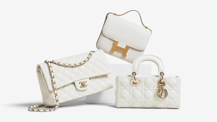 A white Chanel Double flap, a white Lady D-Joy, and an a whiter Hermes Constance